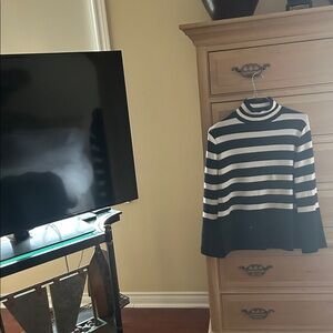 Women’s black and white turtle neck